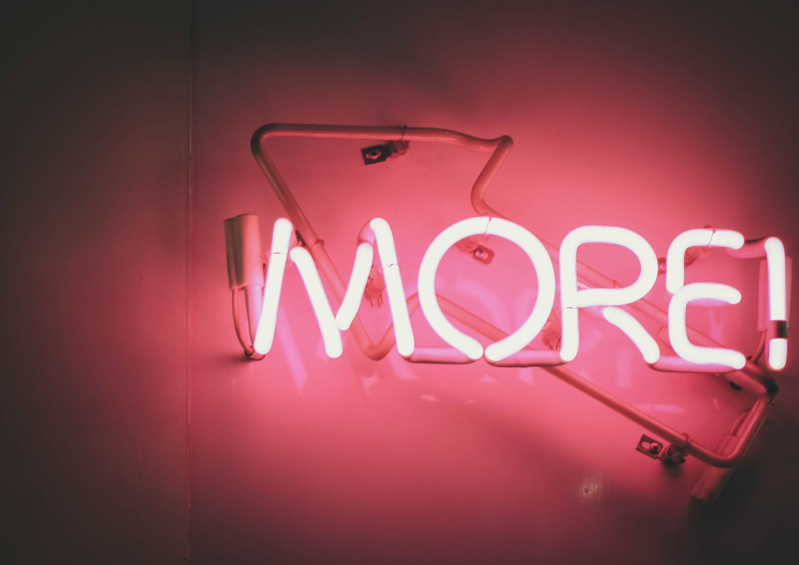 a neon sign that says more on it